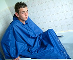 getting a poncho wet in the bath